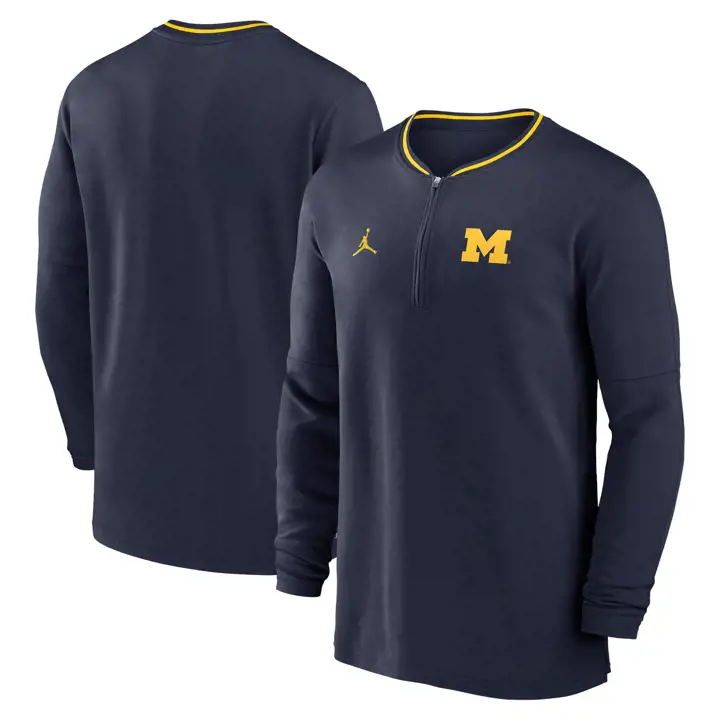 HAUT MANCHES LONGUES EN MOLLETON 1/2 ZIP NCAA MICHIGAN WOLVERINES ENTRAÎNEURS MARINE/JAUNE 24